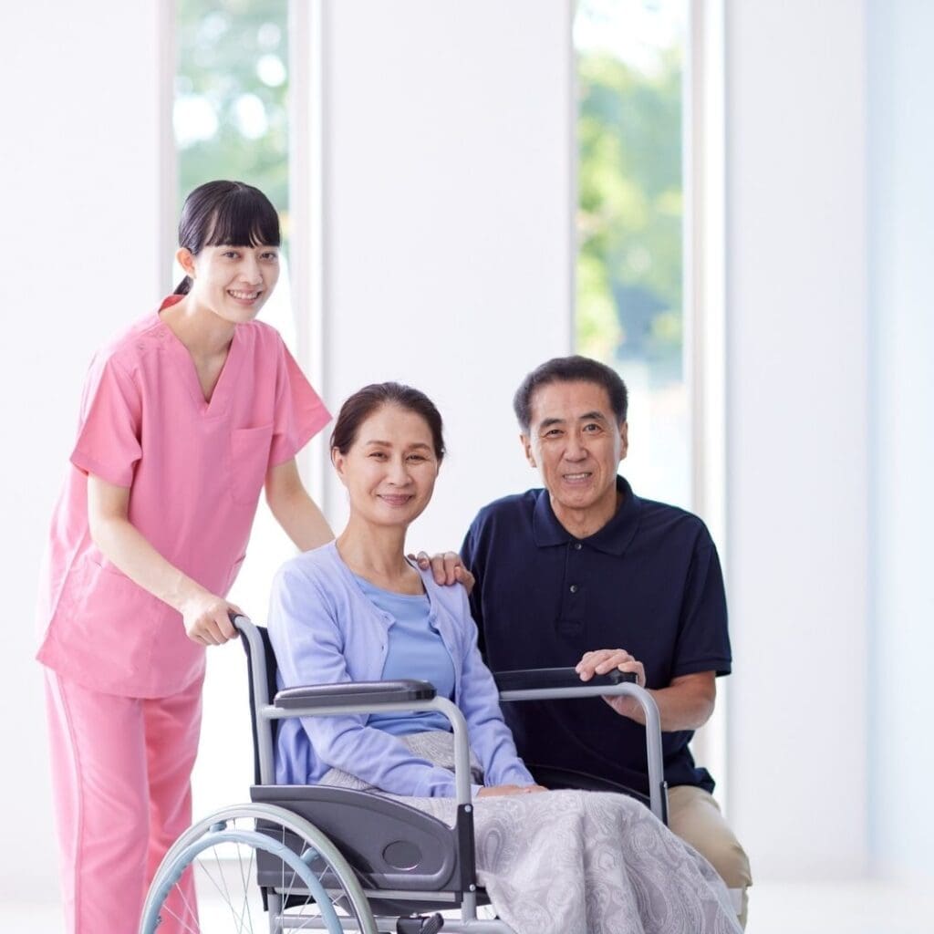 A nurse assisting their patient