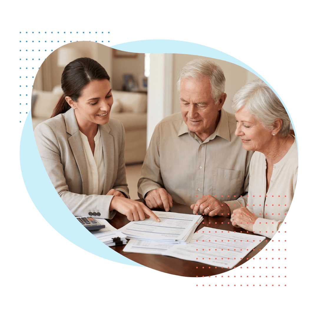 A reassuring Best Care specialist explaining Long Term Care Insurance paperwork and policy benefits to a senior couple in their home.