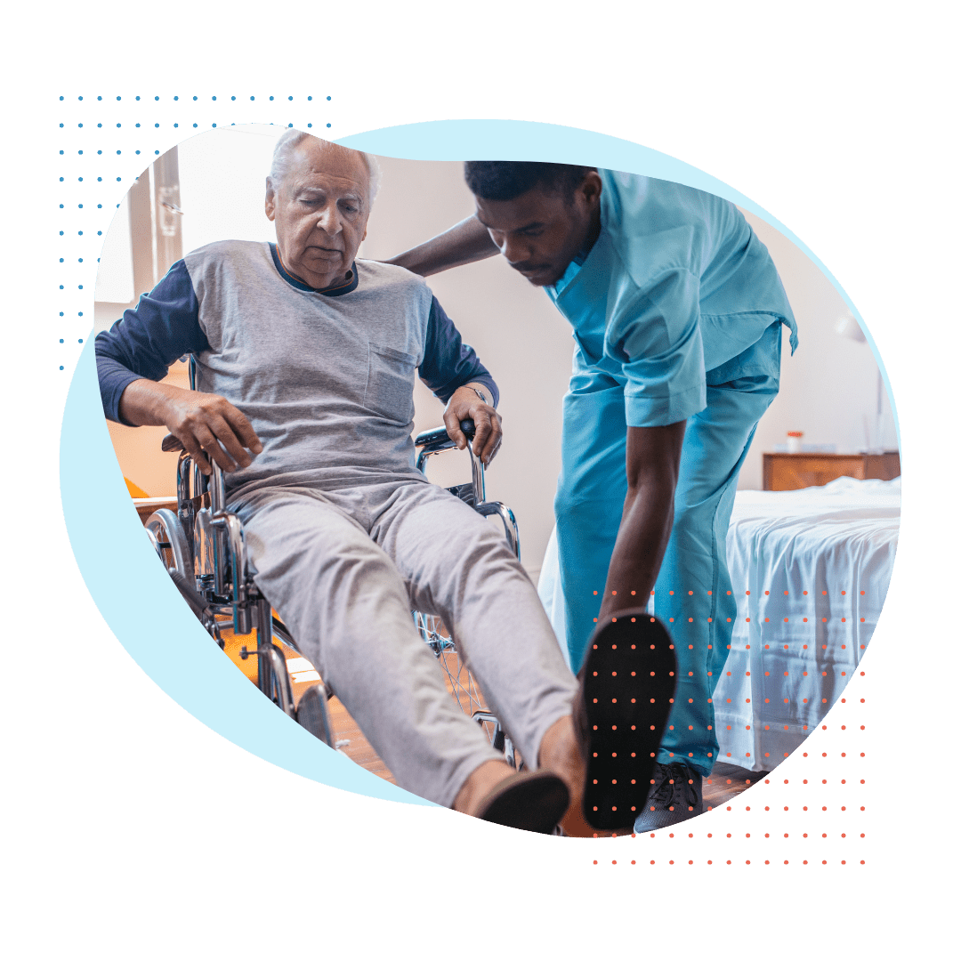 nurse helping patient out of wheelchair