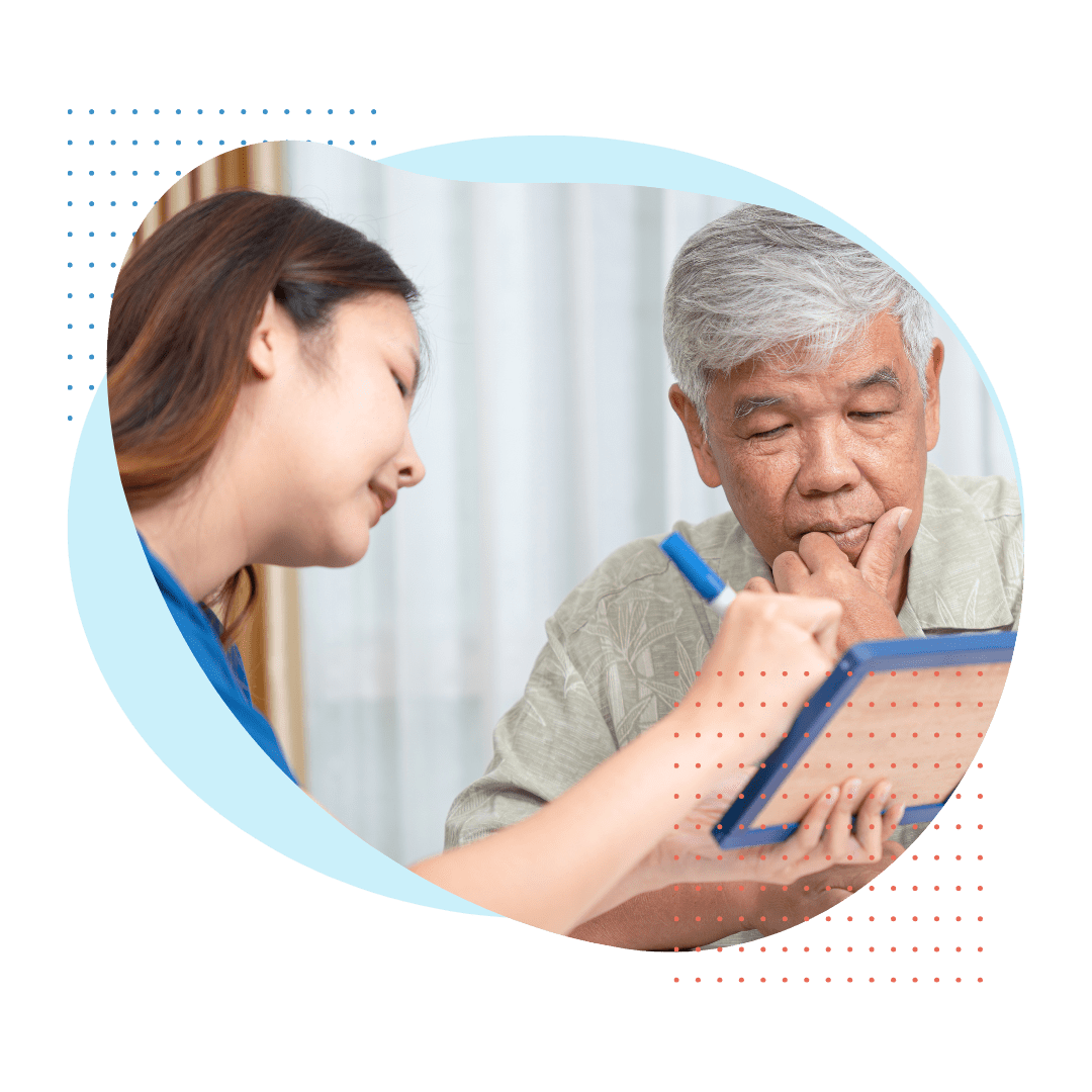 nurse showing a patient a tablet